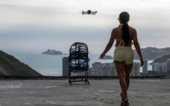 Set to an infectious beat, the video of the Rocinha favela has exploded on social media at a time when the city is drawing record tourists