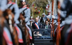 President Jose Antonio Kast leaves his inauguration ceremony in a convertible