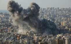 Smoke billows from an Israeli strike in the southern suburbs of Beirut on March 10, 2026