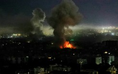 Smoke rises from the site of an Israeli airstrike that targeted an area in Beirut's southern suburbs on March 11, 2026