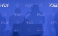 The shadows of US President Donald Trump and Russian President Vladimir Putin seen at their 2025 summit in Anchorage