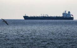 The United States has temporarily allowed the sale of oil from Russia that is at sea, as oil prices hold above $100 a barrel