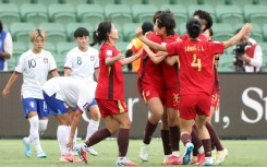 China players celebrate a goal by Shao Ziqin during the AFC Women's Asian Cup quarter-final against Taiwan
