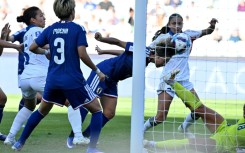 Mina Tanaka (C) scored Japan's opening goal in theirWomen's Asian Cup quarter-final with the Philippines
