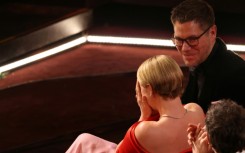 Jessie Buckley, sitting next to her husband Freddie Sorensen, was overwhelmed with emotion when the award was announced