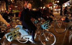 Socialist candidate Emmanuel Gregoire hopped on one of Paris's iconic rental bikes to head to city hall