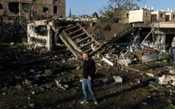 Smoke rises from an Israeli airstrike on the Qasmiyeh bridge in south Lebanon