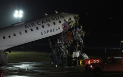 The Air Canada plane collided with a fire truck on a runway at LaGuardia Airport in New York