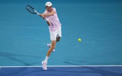 Jannik Sinner blasts a backhand against Corentin Moutet in his victory at the Miami Open