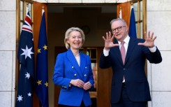 Australian Prime Minister Anthony Albanese (R) welcomes European Commission President Ursula von der Leyen for talks at Parliament House in Canberra on March 24, 2026