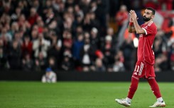Mohamed Salah applauds as he leaves the pitch after being substituted during Liverpool's Champions League match against Galatasaray