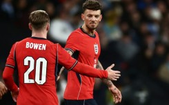 England defender Ben White (R)