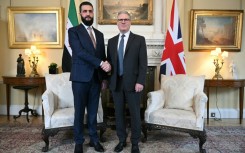 Syria's President Ahmed al-Sharaa is welcomed by Britain's Prime Minister Keir Starmer for talks at 10 Downing Street in central London