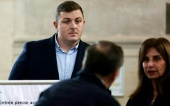 Former Irish rugby player Denis Coulson (L) in court before his trial for rape in Bordeaux in 2024