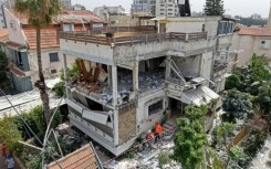 A damaged building from an Iranian strike in a residential part of Israel's city of Tel Aviv