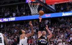 Denver's Nikola Jokic scores against Victor Wembanyama in the Nuggets' NBA overtime win over the San Antonio Spurs