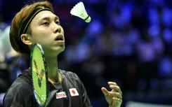 Japan's Kodai Naraoka tosses up a shuttlecock at the badminton world championships in Paris on August 28