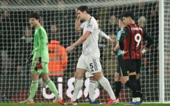 Manchester United defender Harry Maguire (C) was sent off during a 2-2 draw away to Bournemouth in the Premier League last month