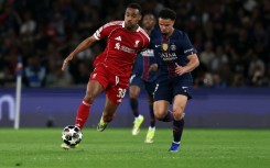 Liverpool midfielder Ryan Gravenberch (L)