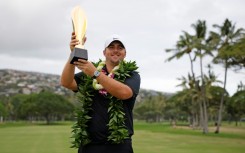 Chris Gotterup celebrates with the trophy after winning this year's Sony Open. The PGA Tour is now scrapping its season-opening swing in Hawaii