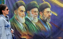 Iran's parliament speaker said the country would not reopen the Strait of Hormuz as long as the US naval blockade remained