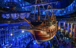 Visitors under the Galeon Espiritu Santo, a full-scale representation of a 17th century galleon, on display at the Museo del Galeon in Manila