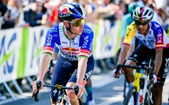 Olympic champion Remco Evenepoel (L) tipped his hat to Paul Seixas, 'one of the best climbers in the world'
