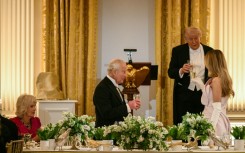 Britain's King Charles III shared a toast with US President Donald Trump and First Lady Melania Trump as Queen Camilla looks on during a State Dinner in the East Room of the White House
