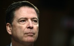 Former FBI director James Comey has been indicted again, this time for allegedly threatening the life of President Donald Trump