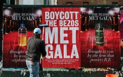 Activists have deployed posters to oppose Jeff Bezos's involvement in the Met Gala