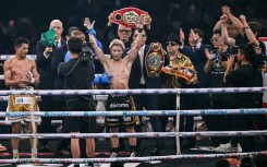 Japan's Naoya Inoue defeated Junto Nakatani by unanimous decision in their championship boxing bout to retain his undisputed super bantamweight titles at the Tokyo Dome