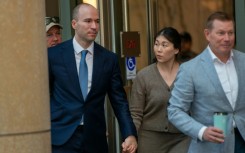 OpenAI president Greg Brockman and wife, Anna Brockman, leave the Ronald V. Dellums US Courthouse in Oakland