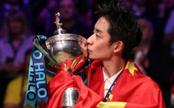 China's Wu Yize celebrates winning the World Snooker Championship