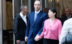 OpenAI President Gregory Brockman and his wife Anna Brockman depart court