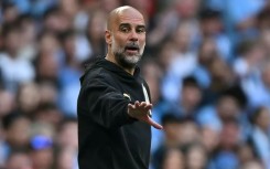 Pep Guardiola's Manchester City trail Arsenal in the Premier League title race