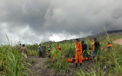 The search is on for the bodies of three hikers who died in a volcanic eruption in Indonesia
