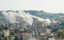 Smoke rises from the site of an Israeli airstrike in south Lebanon, where a truce between Israel and Hezbollah is under strain