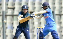 Former England women's wicketkeeper Sarah Taylor (L)