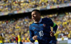 Kylian Mbappe will be on the plane to North America as part of a glittering French forward line, also featuring Ballon d'Or holder Ousmane Dembele and Desire Doue of Paris Saint-Germain and Bayern Munich winger Michael Olise