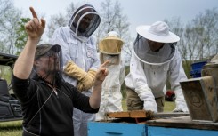 Bee researcher Zac Lamas, left, has taken a job with a local university amid uncertainty about the Beltsville bee lab's future