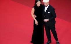 John Travolta (right) with his daughter, actress Ella Bleu Travolta at Cannes
