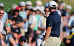 Six-time major winner Rory McIlroy yells at a heckler in the crowd who screamed while he was making a key shot at the par-five 16th hole in the final round of the PGA Championship