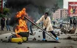 Kenya's public transport system was paralysed when protesters barricaded roads over fuel price hikes