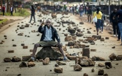 Kenya's public transport system was paralysed when protesters barricaded roads over fuel price hikes