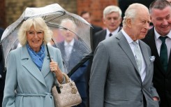Charles and Camilla heard a performance of traditional Irish music and dance and tried out some of the instruments