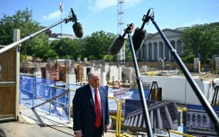US President Donald Trump speaks to the press near the construction site of his proposed ballroom at the White House in Washington, DC, on May 19, 2026.