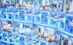 Claw machines in an arcade centre at a shopping mall in Hong Kong