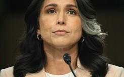 US Director of National Intelligence Tulsi Gabbard said she was resigning to care for her husband