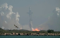 The launch of the mammoth rocket comes as Elon Musk's space company prepares a buzzy initial public offering