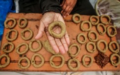 Very few Palestinians are able to make Eid biscuits in their tents due to high prices of cooking gas